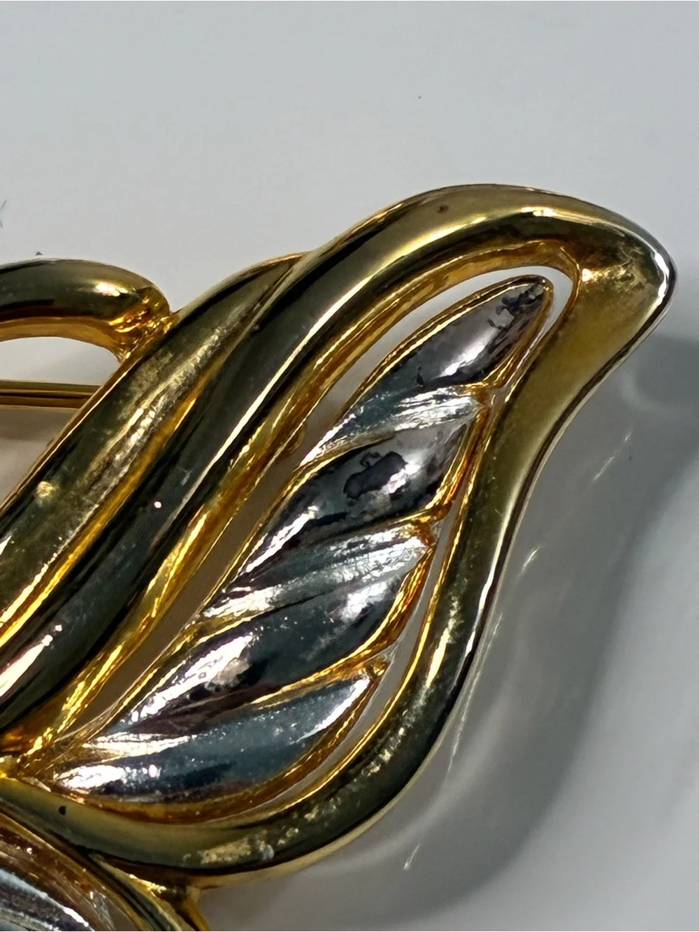 Two-Tone Gold and Silver Butterfly Brooch and Classic Infinity Floral Pin